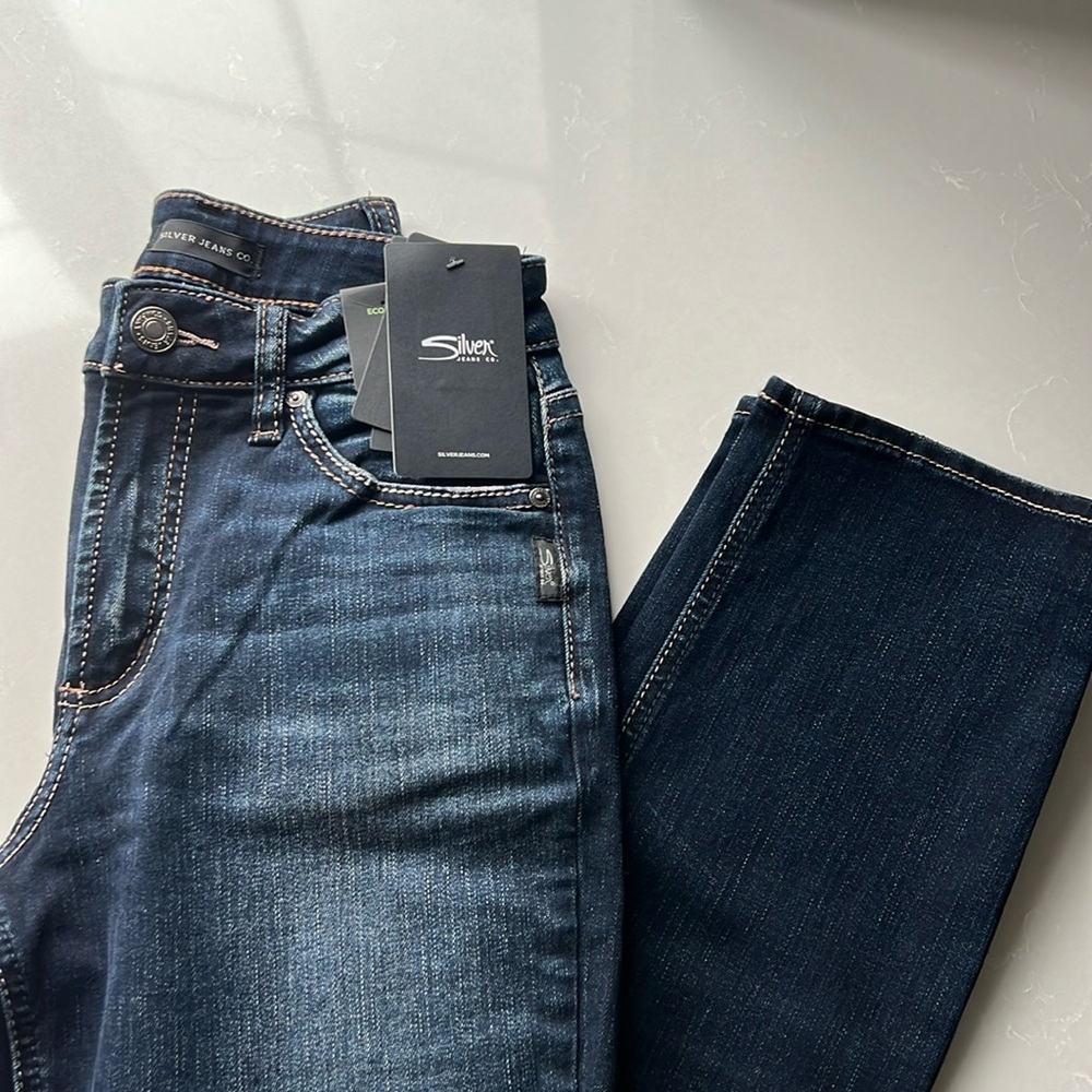 Women’s silver jeans, size 4 waist 27 length 31. New with tags